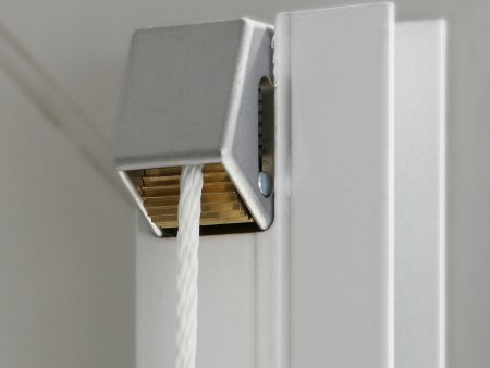 Cord lock locks the roller blind at any height Cord lock locks the roller blind at any height