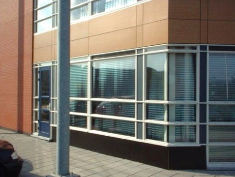 Vertical louver blind with pleated film slats Vertical louver blind with pleated film slats